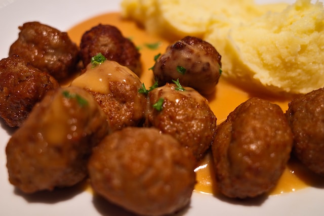 Meatballs topped with sauce