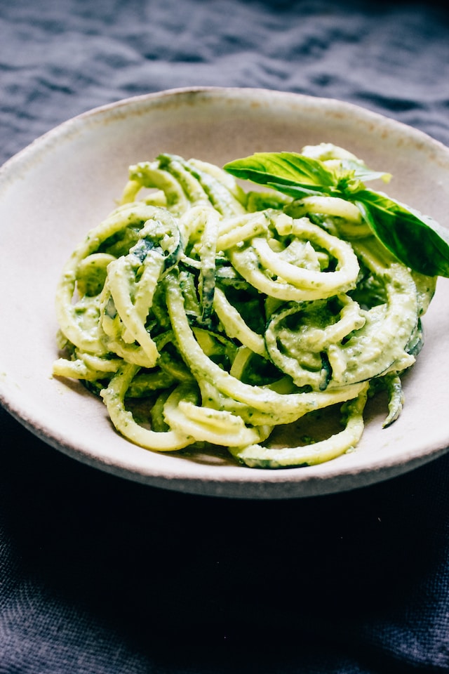 Zucchini noodles on a ceramic plate