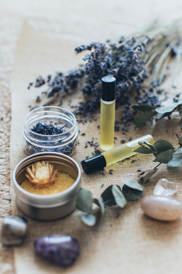 Dried lavender blooms and essential oil 
